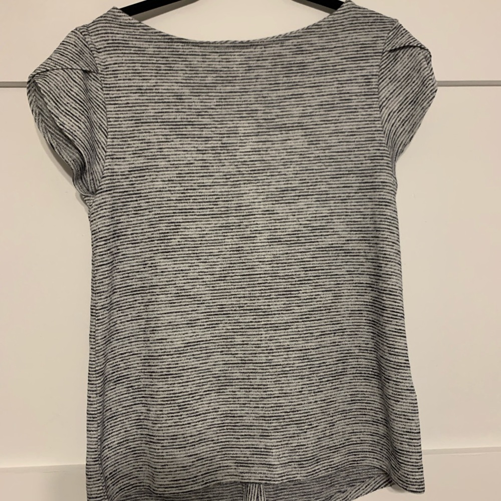 Gray & white top with pretty sleeves and back button detail. Really cute!